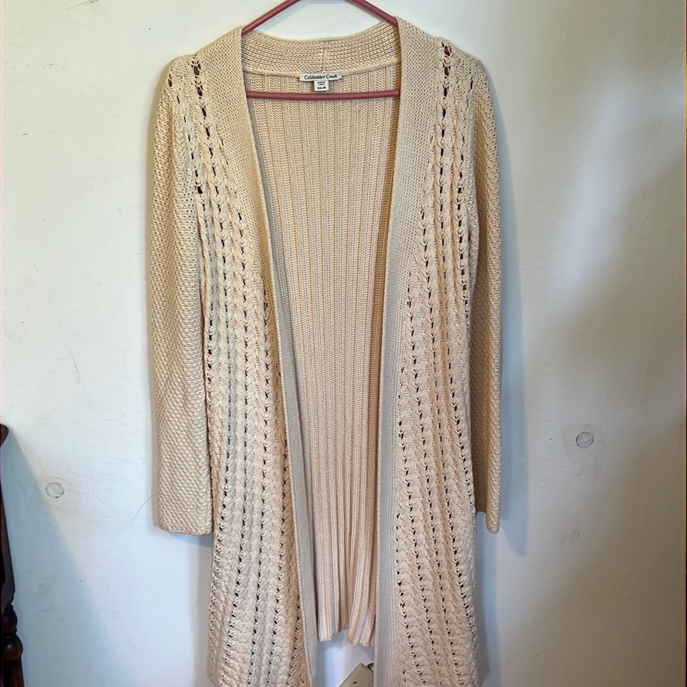 Size small (6-8) long knitted sweater.